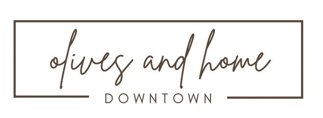 Logo for 'olives and home Downtown' with a decorative border.